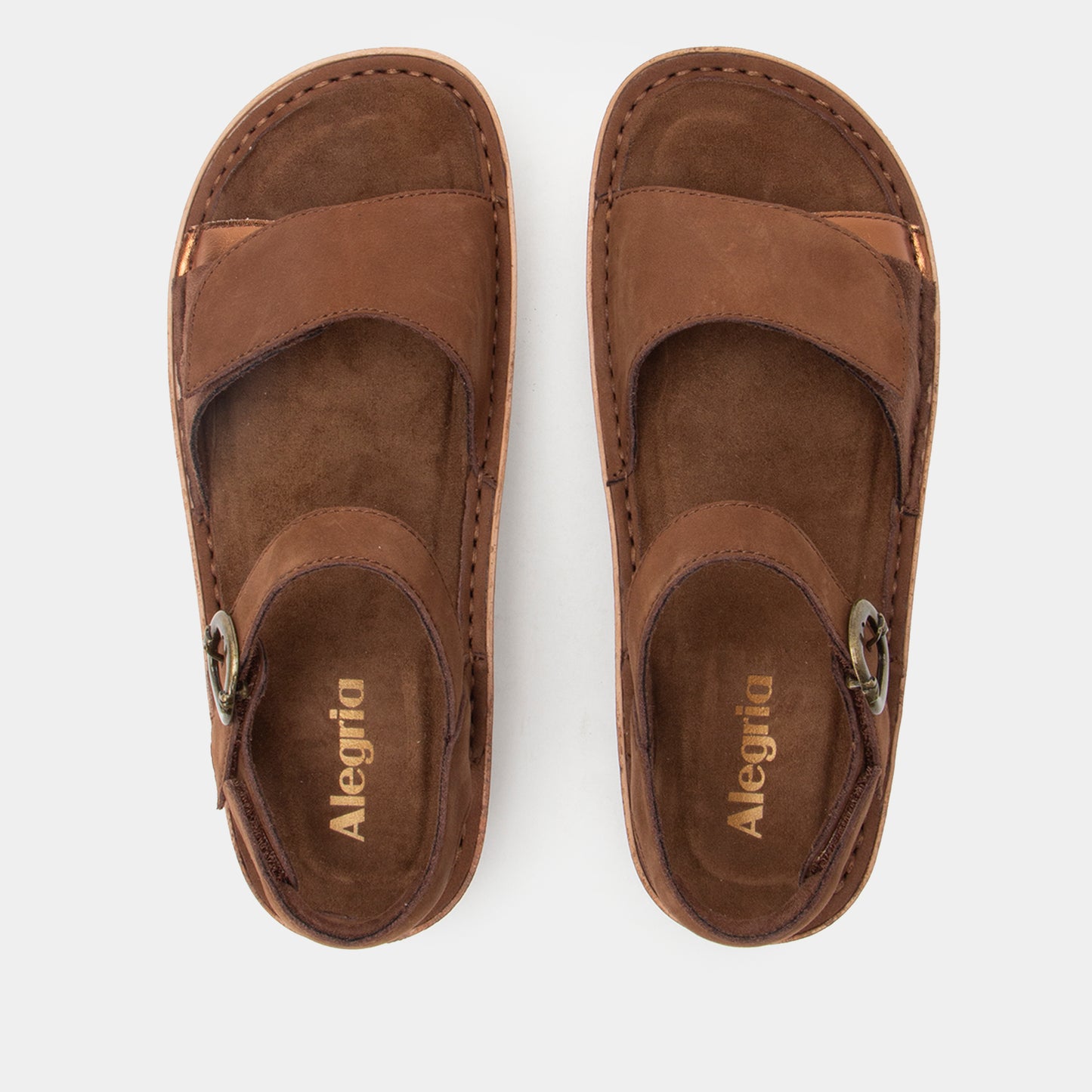 Pair of brown sandals with 'Alegria' branding on a white background