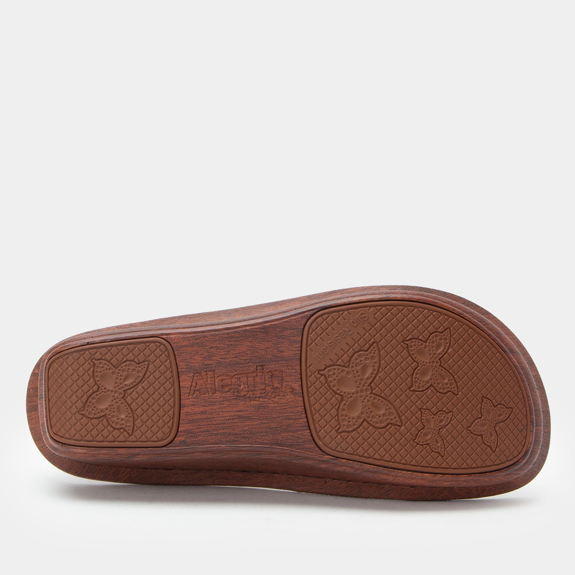 Brown sandal sole with brand logo on a white background