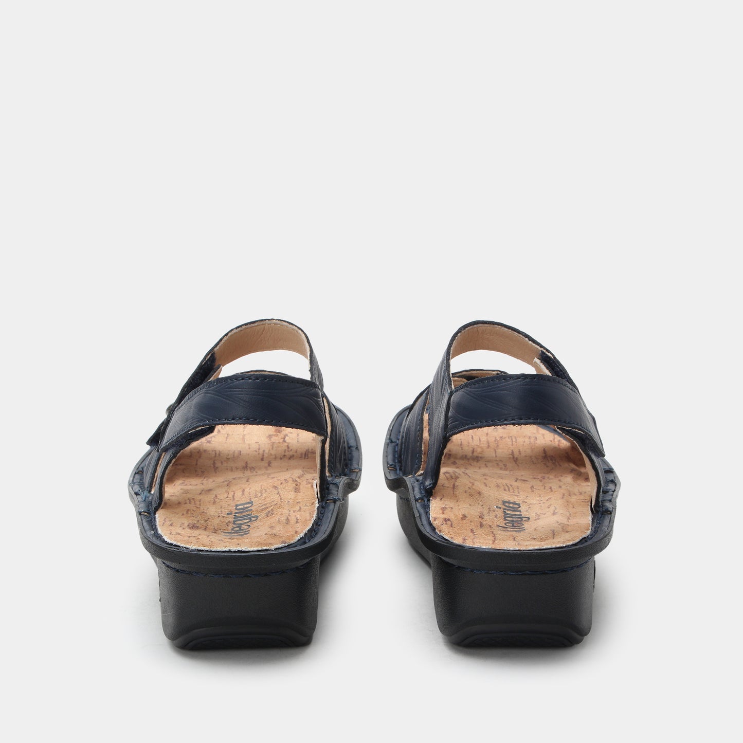 Pair of black sandals on a white background