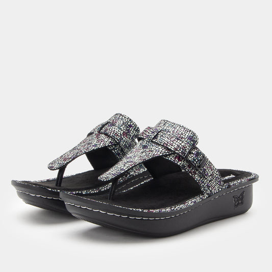 Black and silver sandal on a white background
