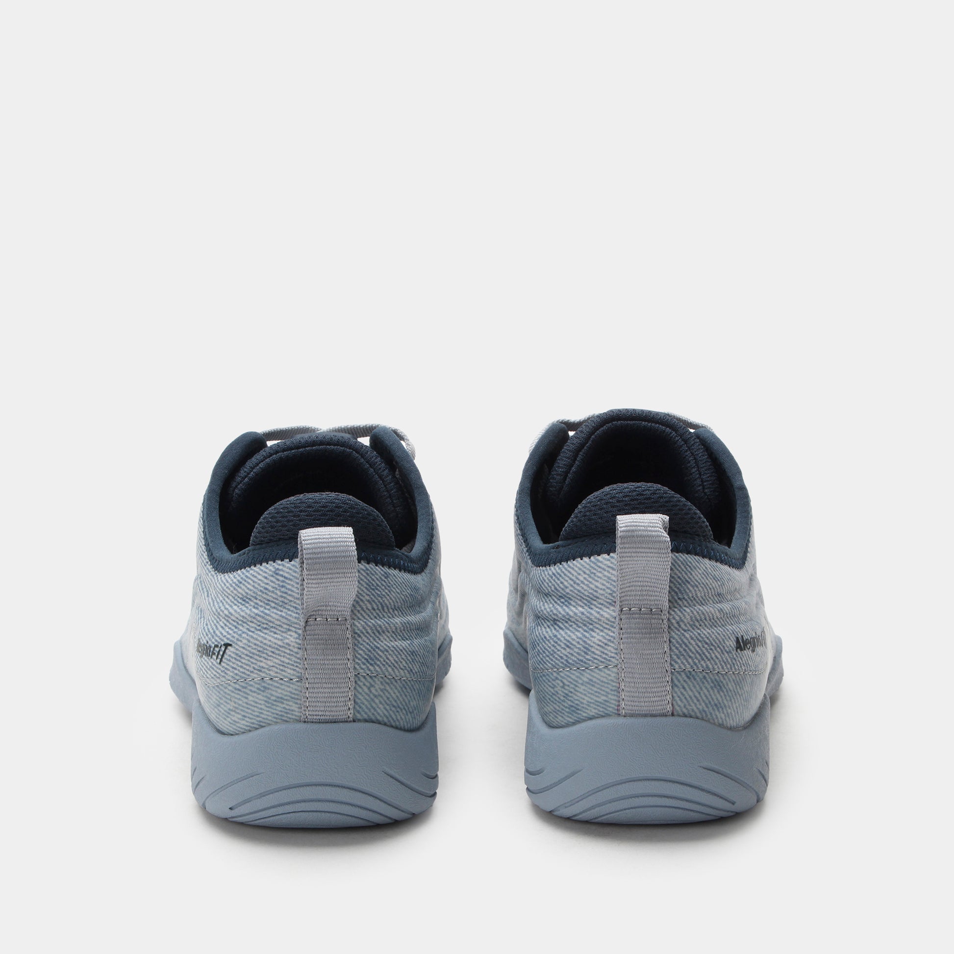 Pair of gray athletic shoes on a white background