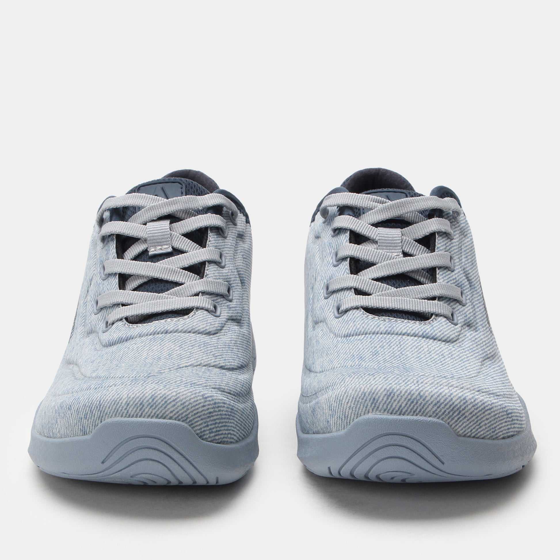 Pair of gray sneakers on a white background