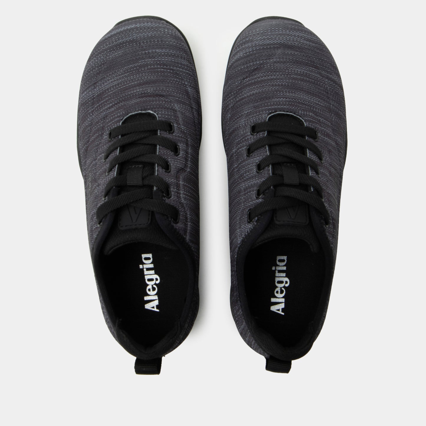 Pair of dark gray sneakers with black soles on a light gray background, featuring the brand 'Alegria'.