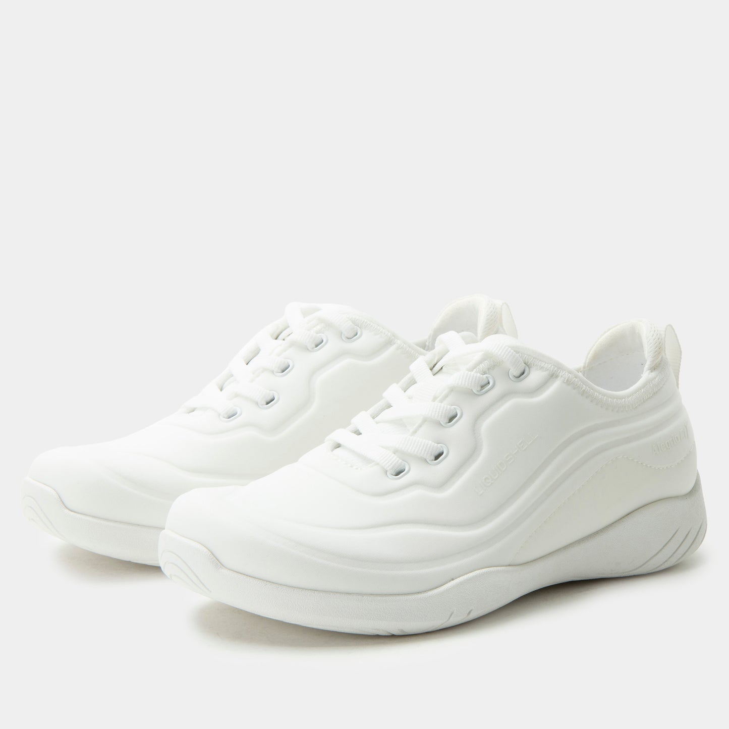 White sneakers on a light gray background