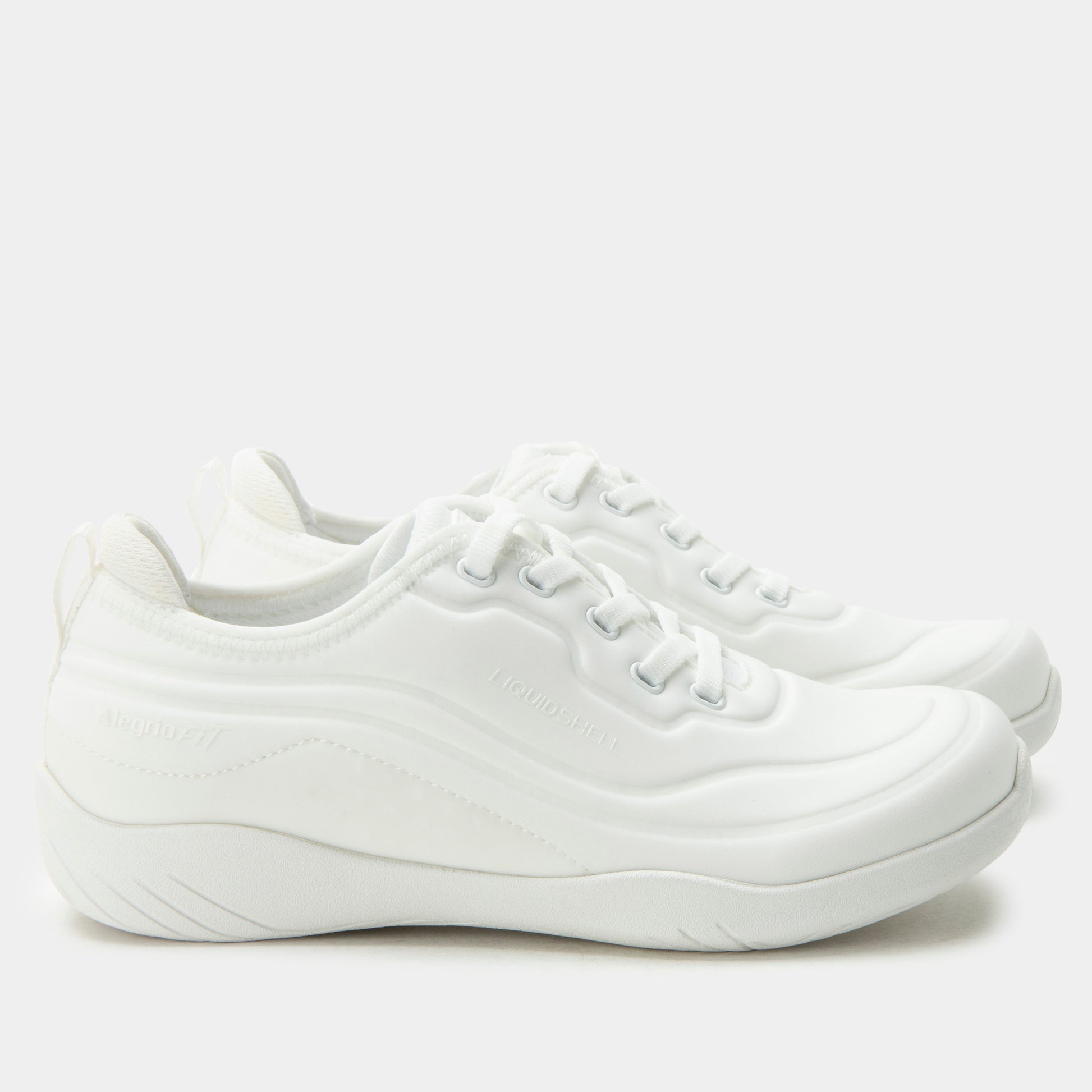White sneakers on a light gray background