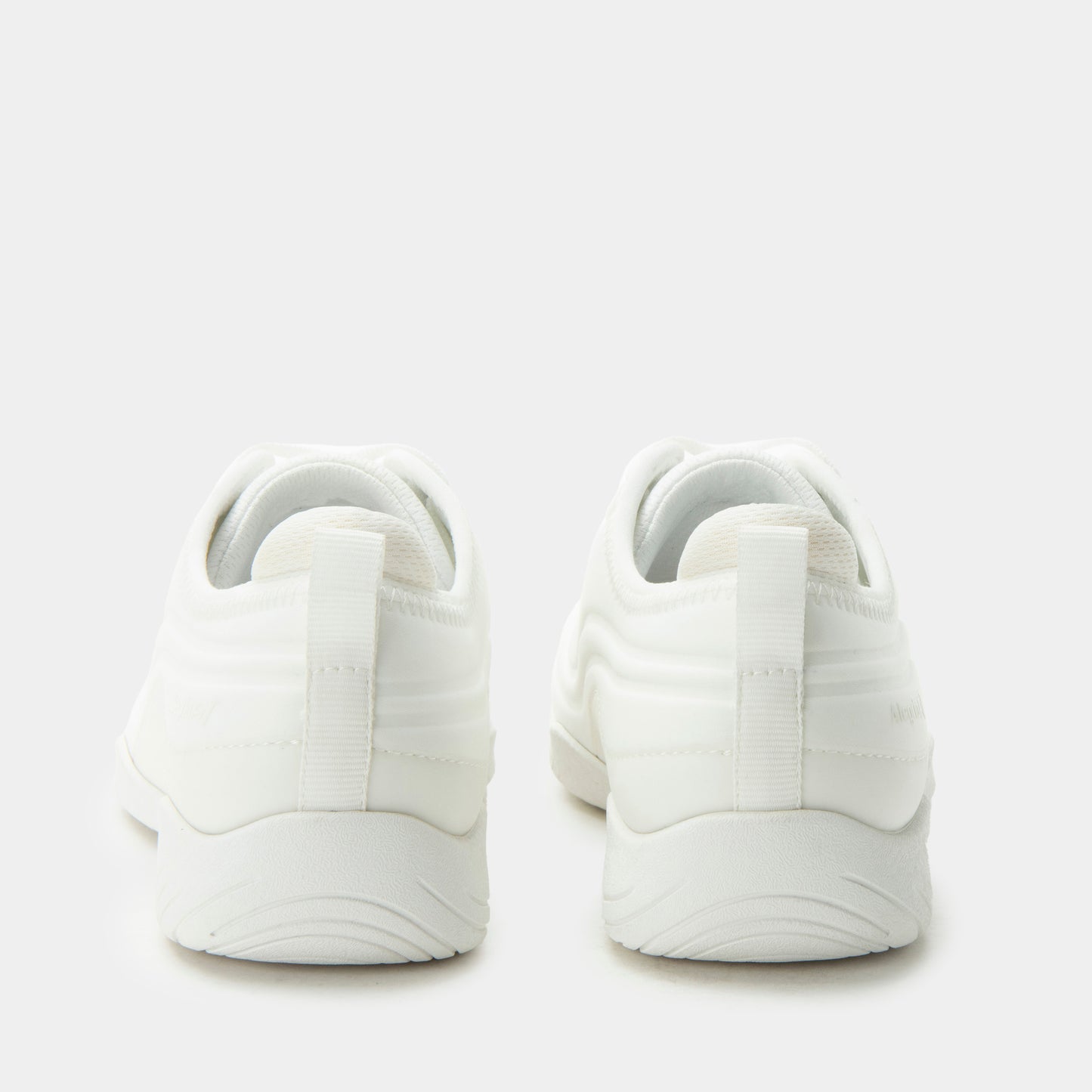 White sneakers on a light gray background