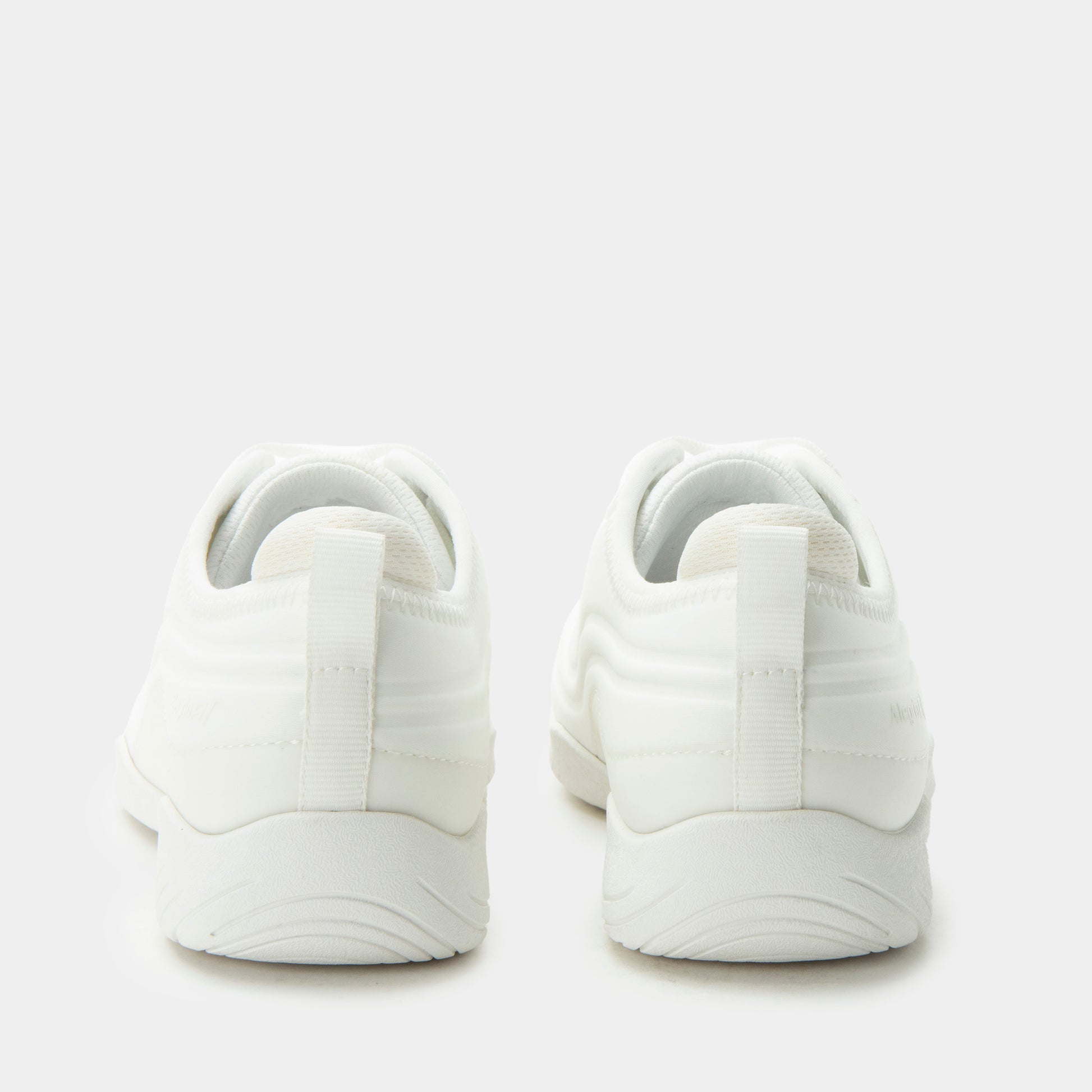 White sneakers on a light gray background