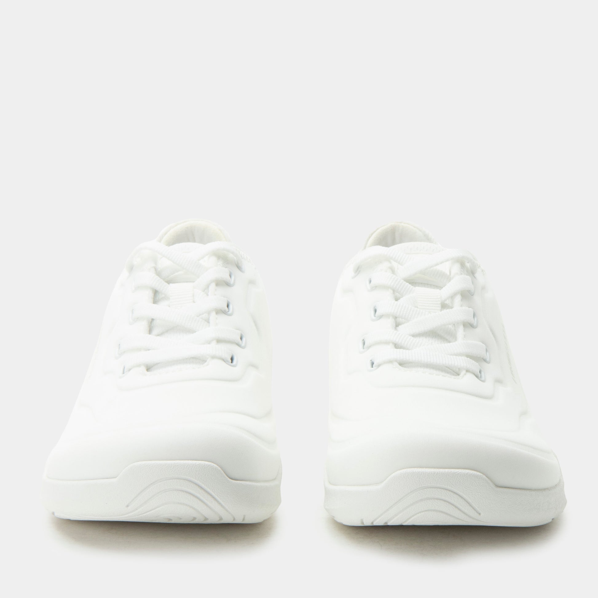 White sneakers on a white background