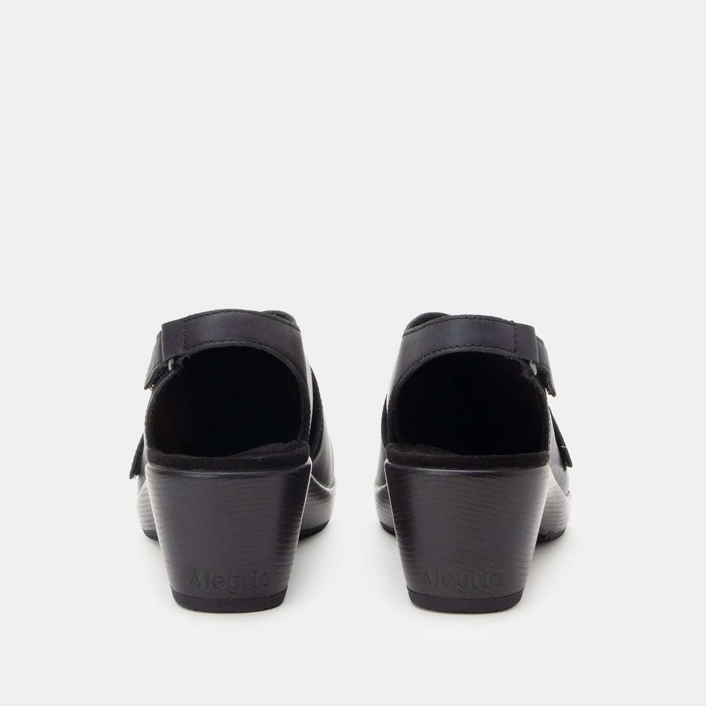 Black sandals with a strap on a white background