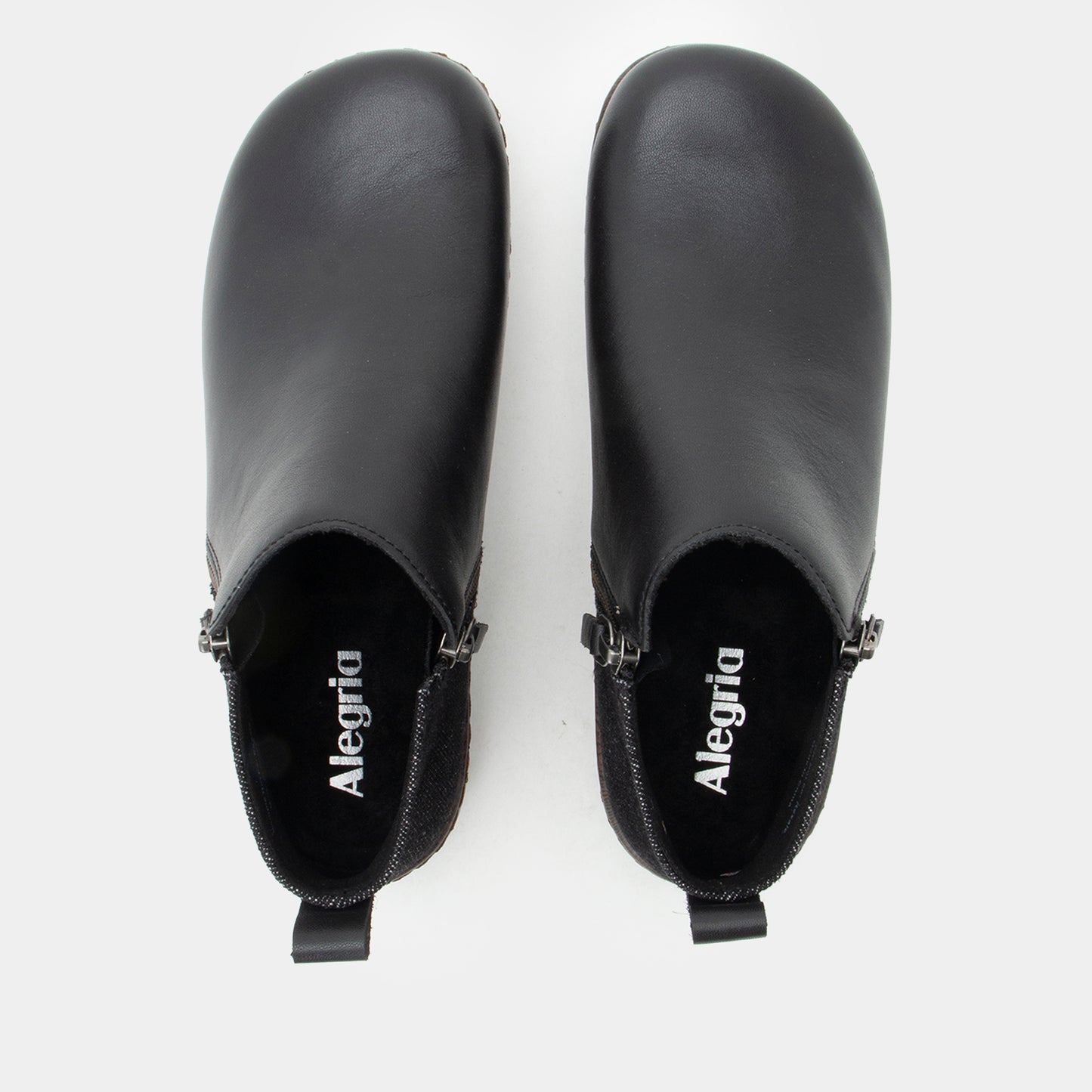Pair of black Alegria shoes on a white background