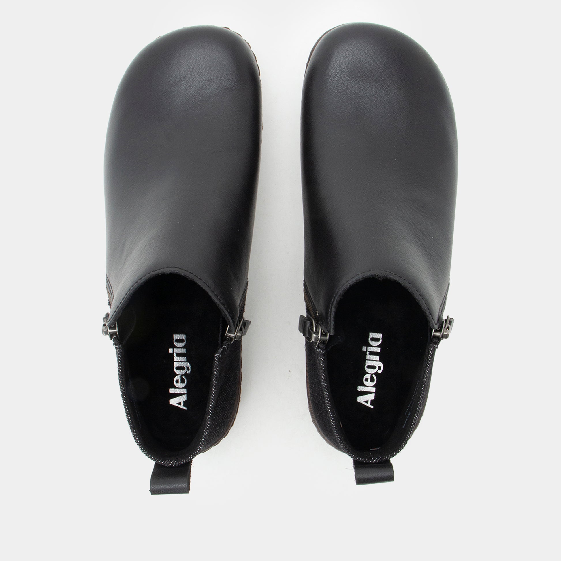Pair of black Alegria shoes on a white background