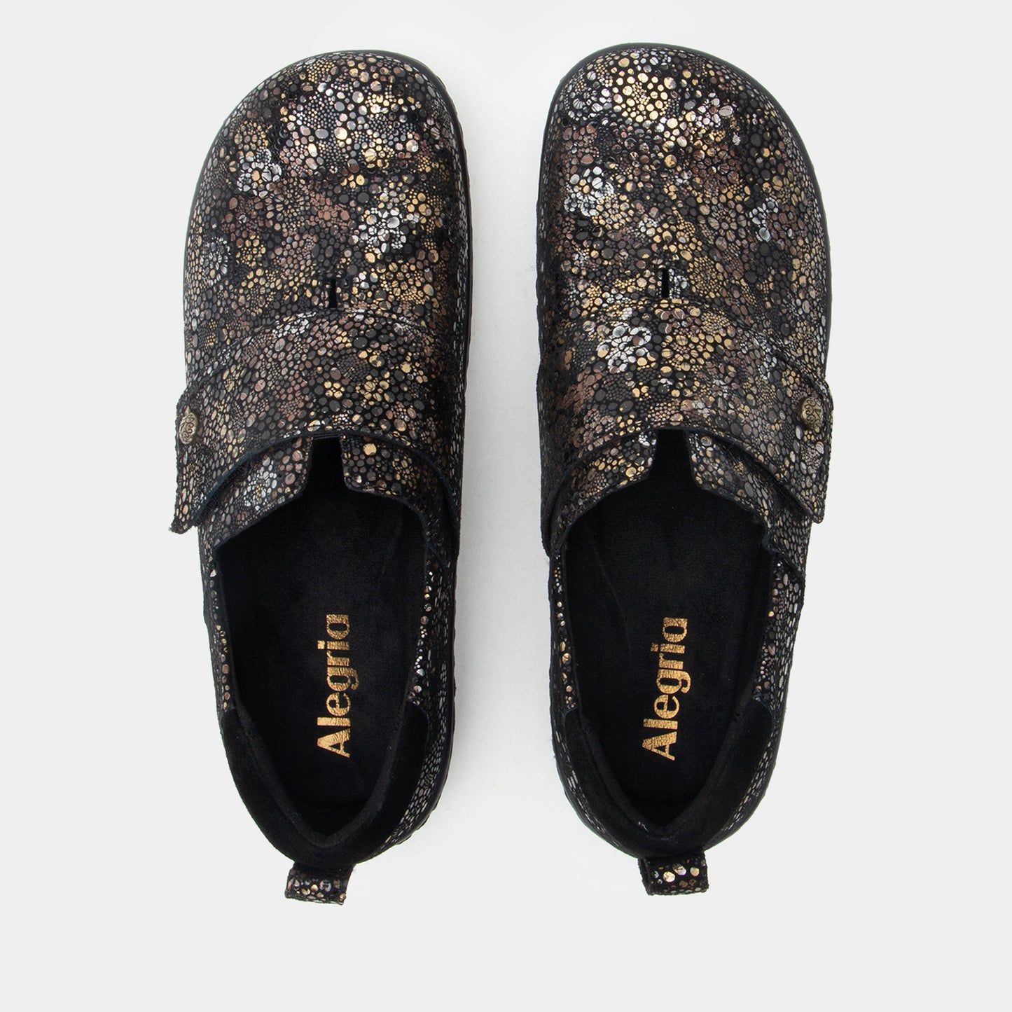 Pair of glittery black shoes with 'Alegria' branding on a white background