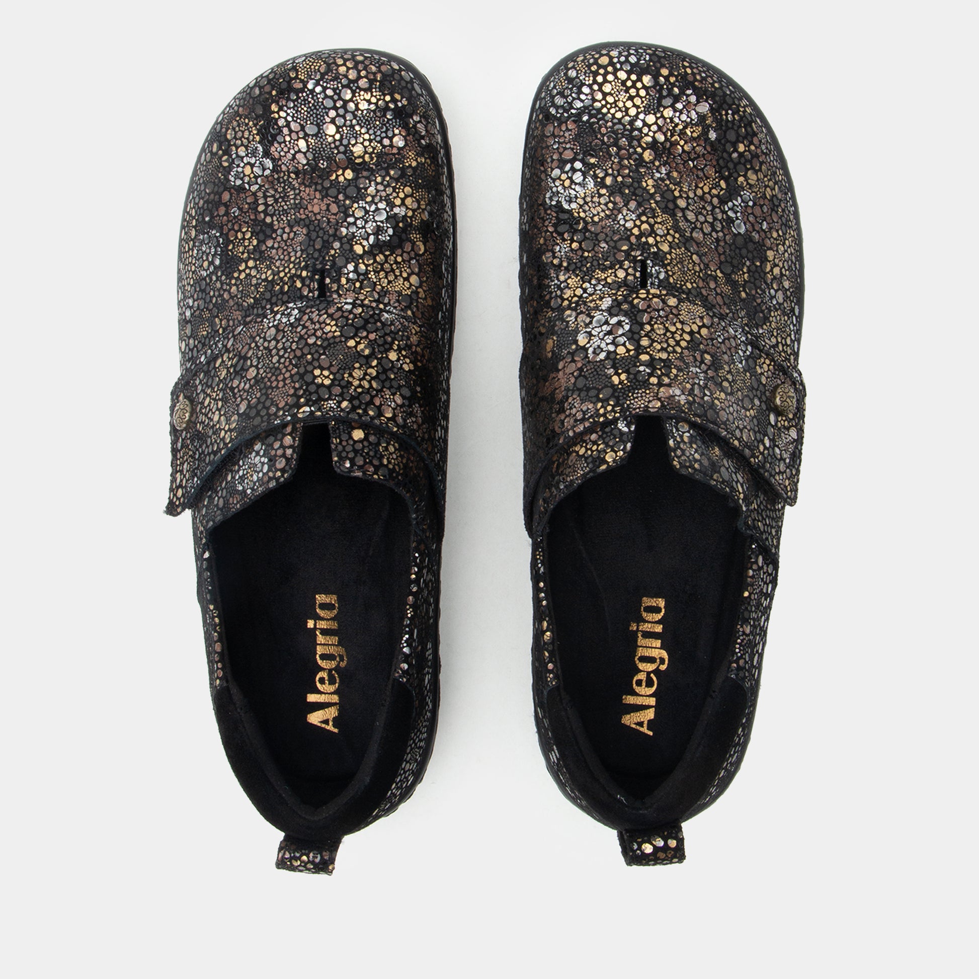 Pair of glittery black shoes with 'Alegria' branding on a white background
