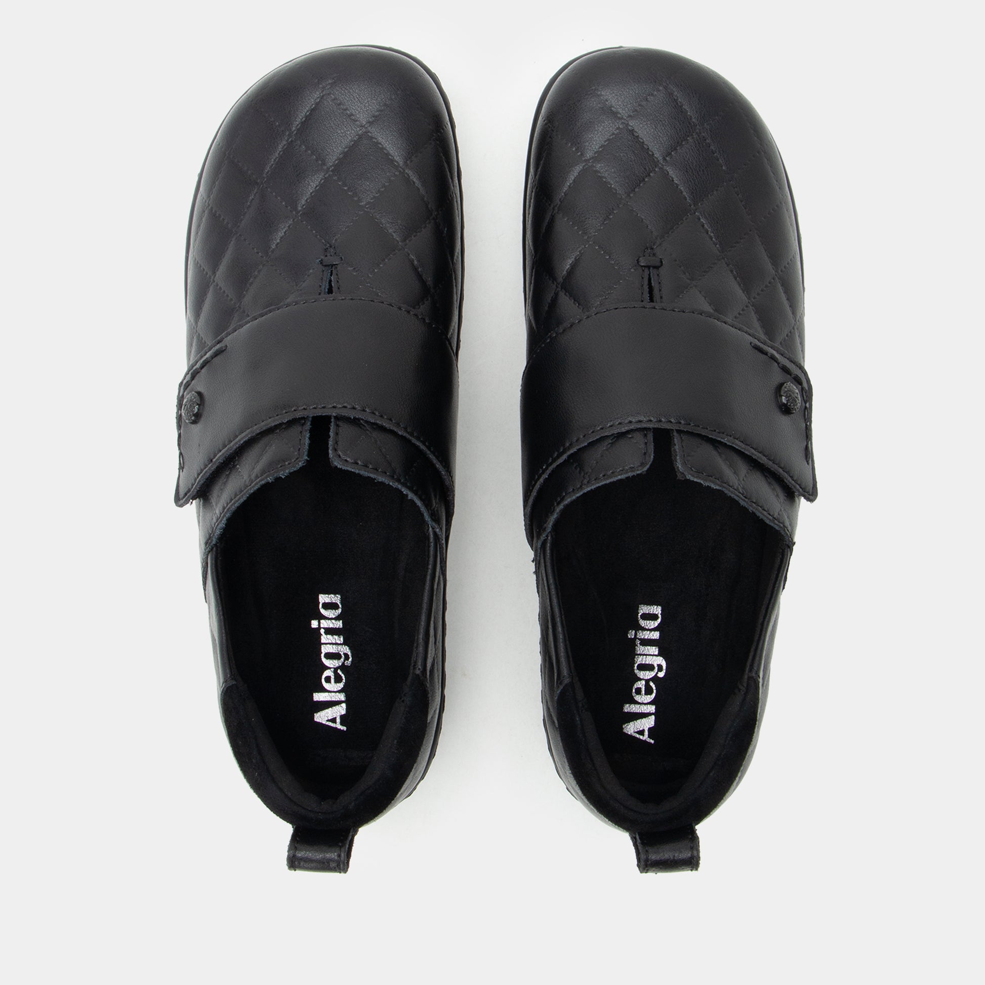 Pair of black Alegria shoes on a white background