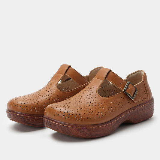 Pair of brown leather shoes with buckles on a white background