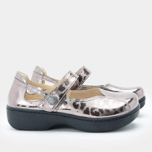 Silver metallic shoes with leopard print accents on a white background