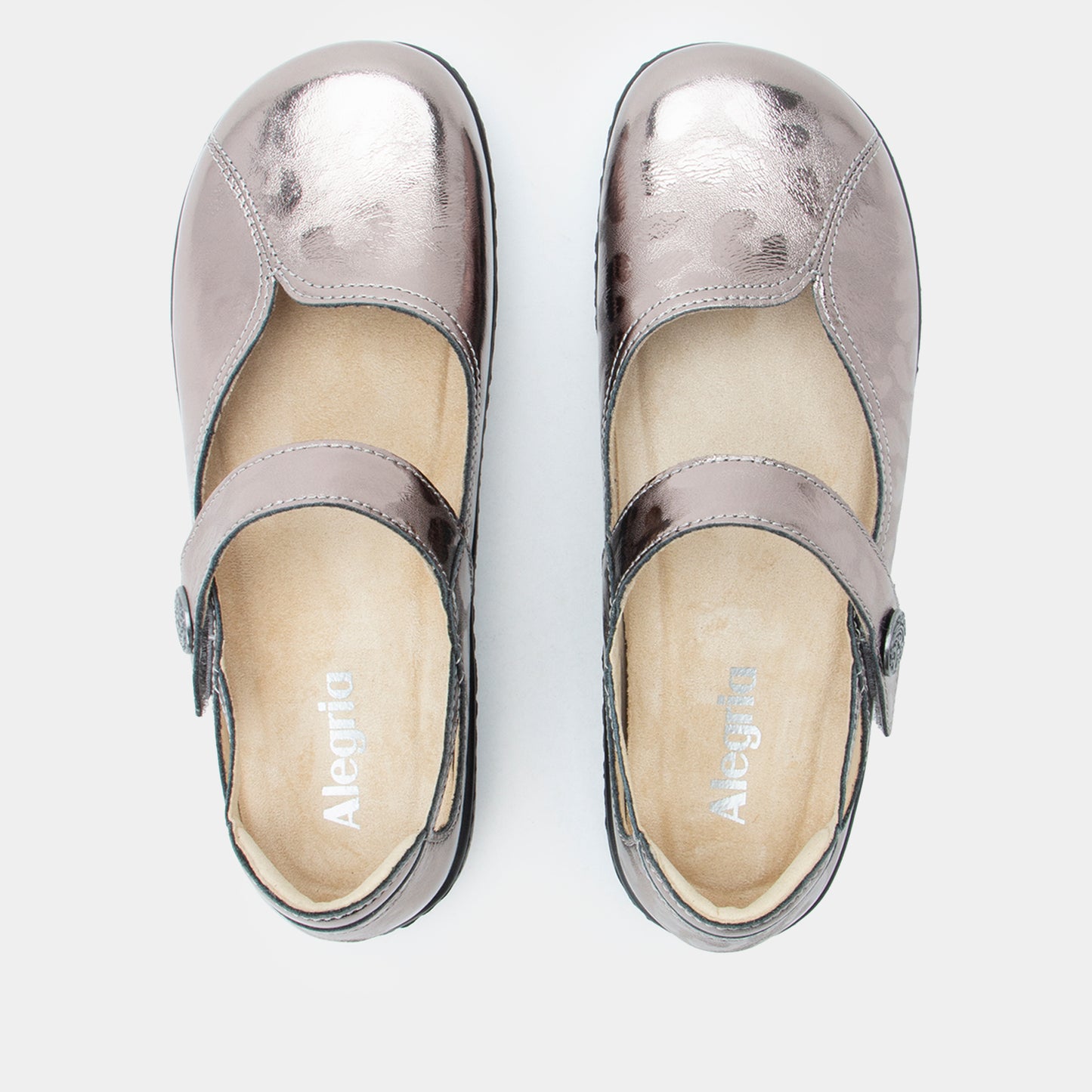 Pair of silver shoes with 'AllerPro' branding on a white background