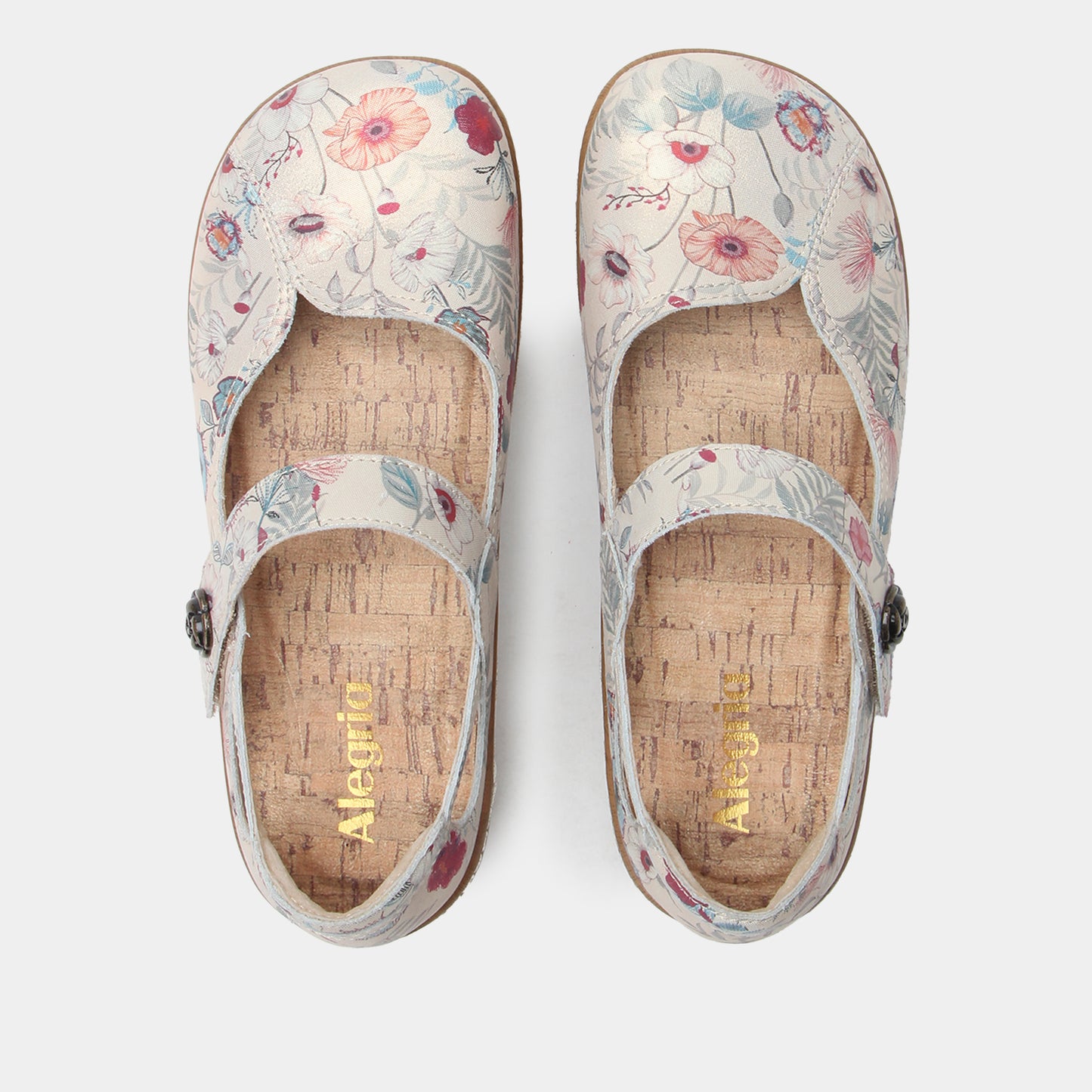 Pair of floral-patterned clogs on a white background