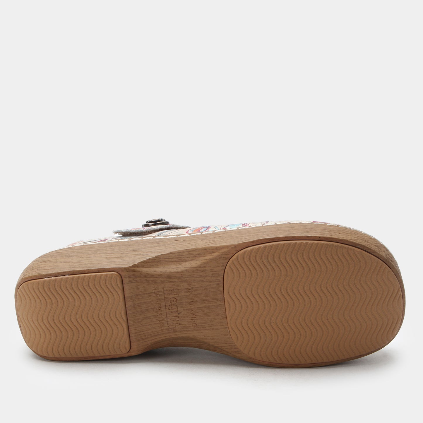 Brown shoe sole with a visible brand logo on a white background