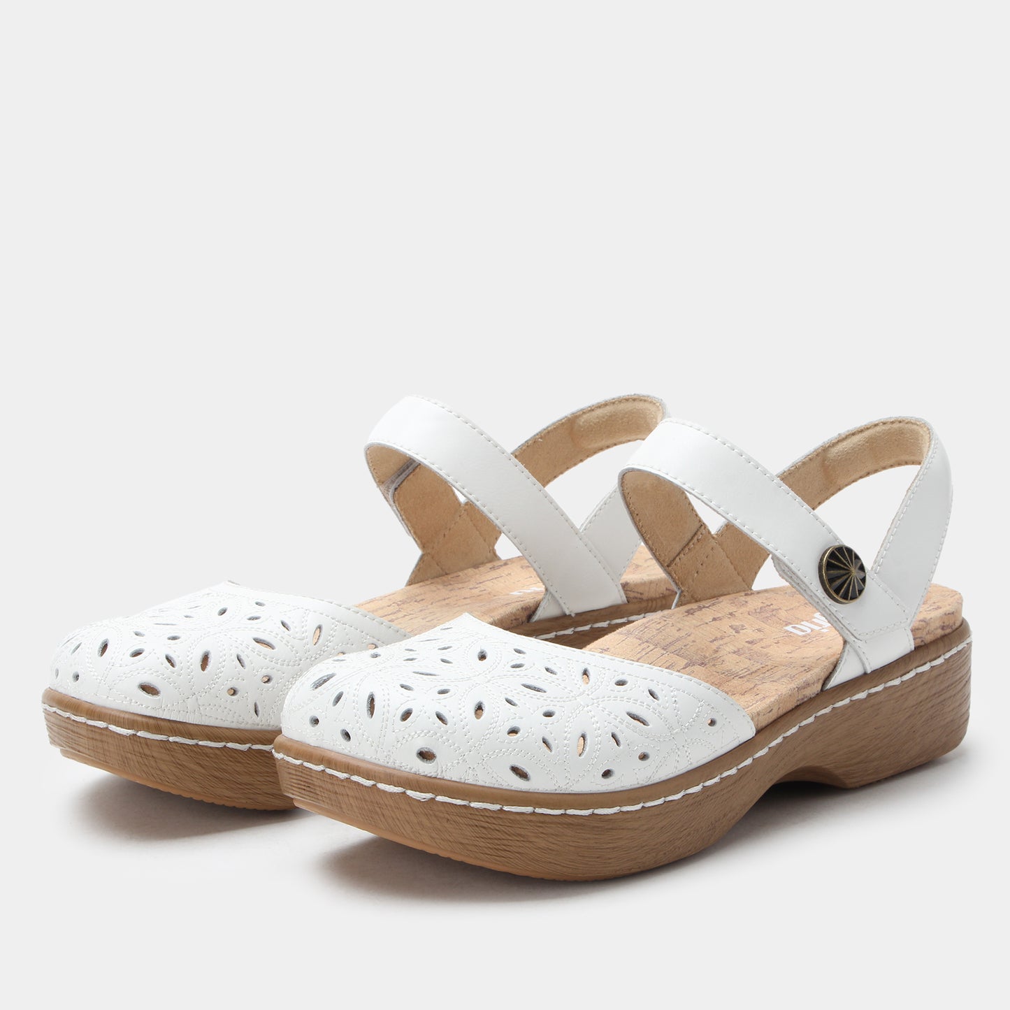 White clogs with wooden sole on a light gray background