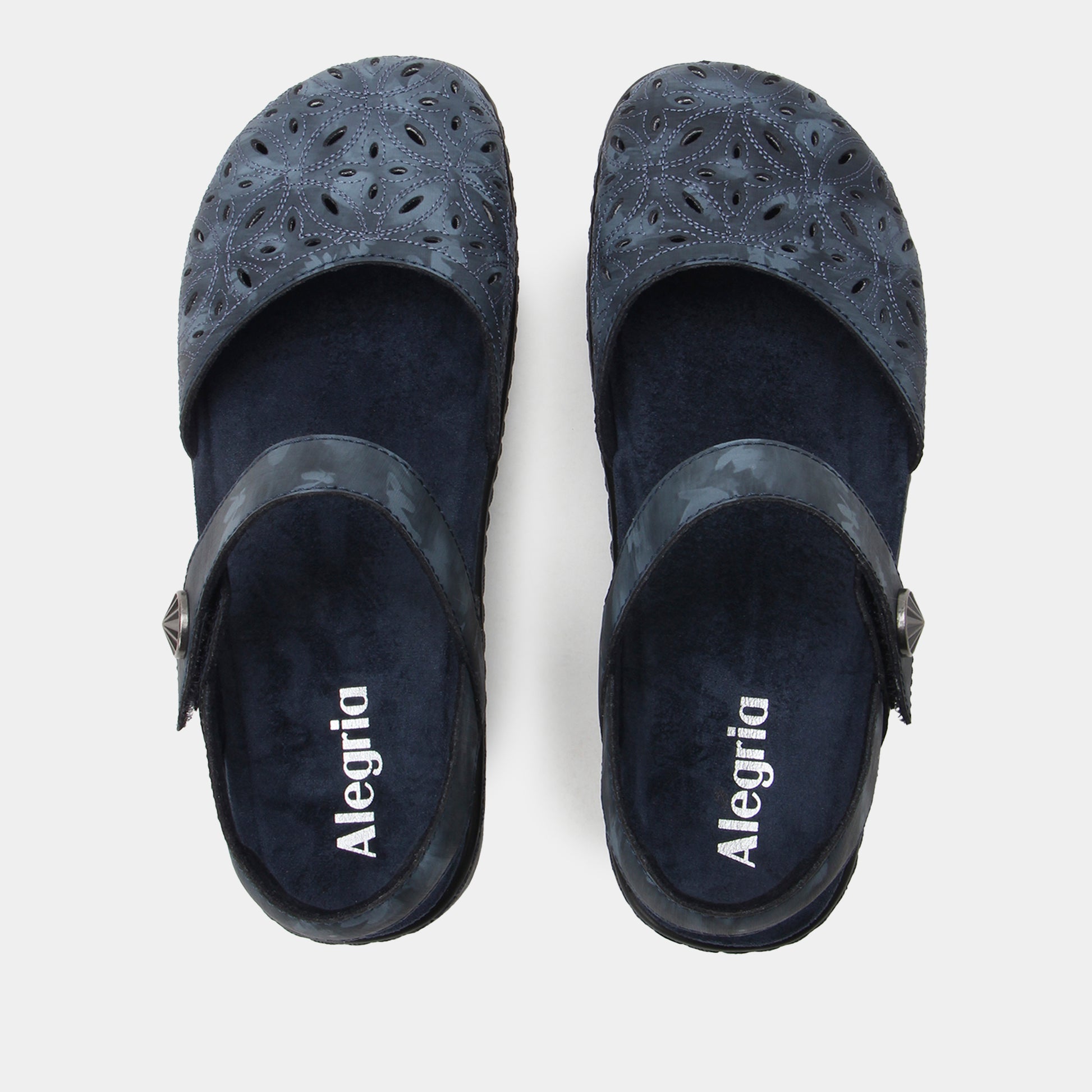 Pair of black sandals with 'Alegria' branding on a light gray background