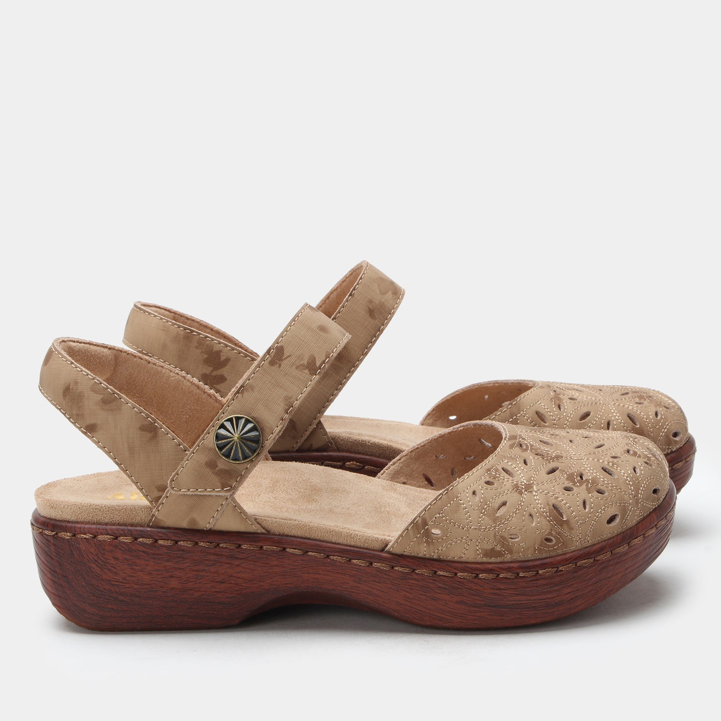 Beige sandal with wooden sole on a white background