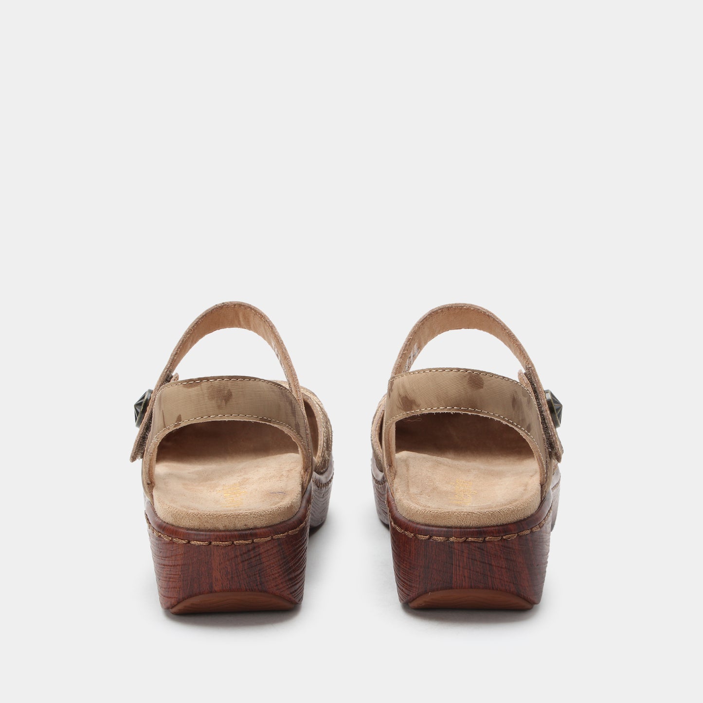 Pair of brown sandals on a white background
