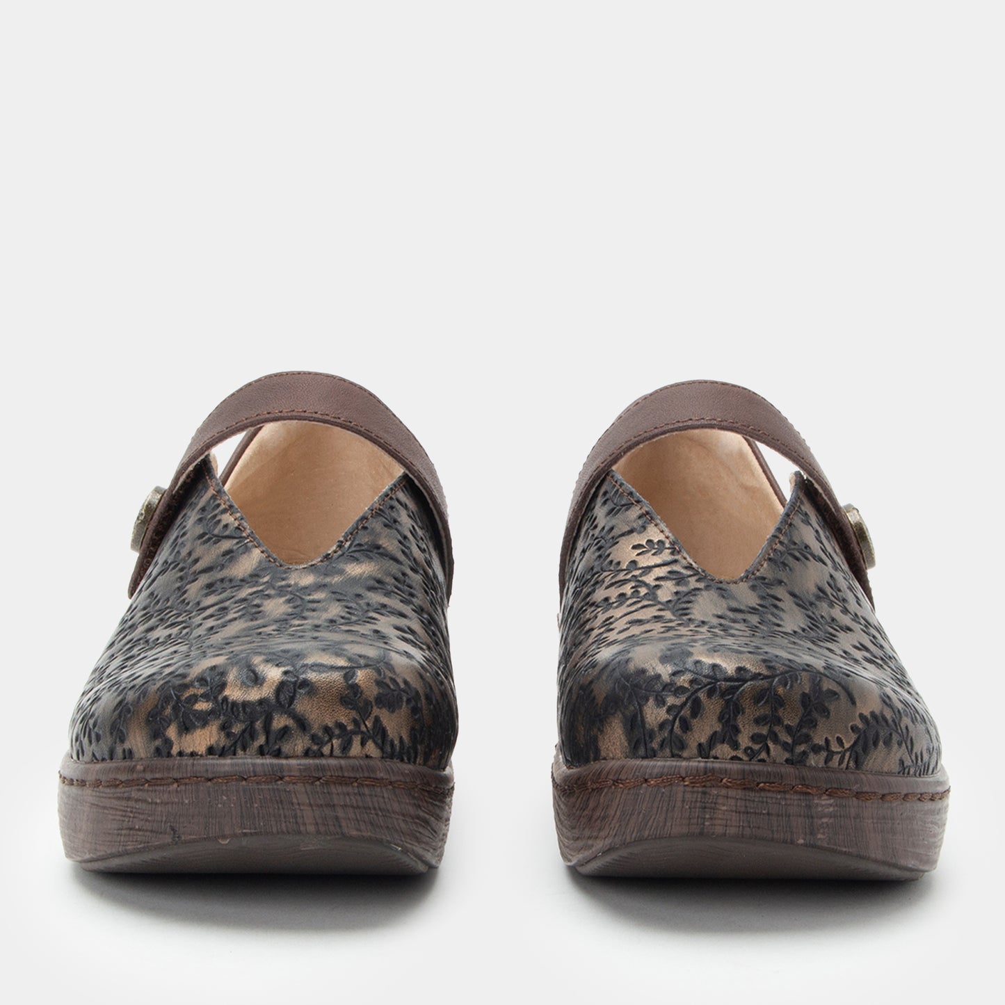 Pair of patterned shoes on a white background