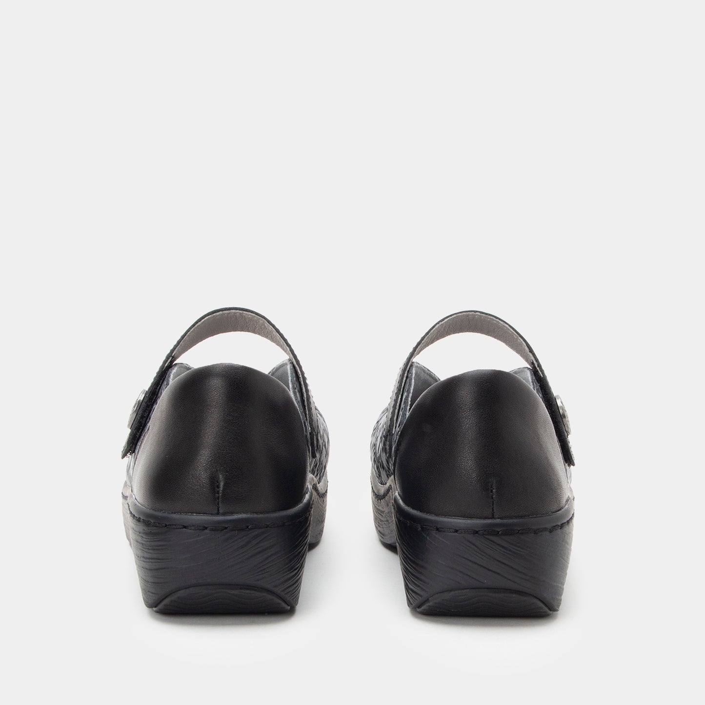 Black clogs on a white background