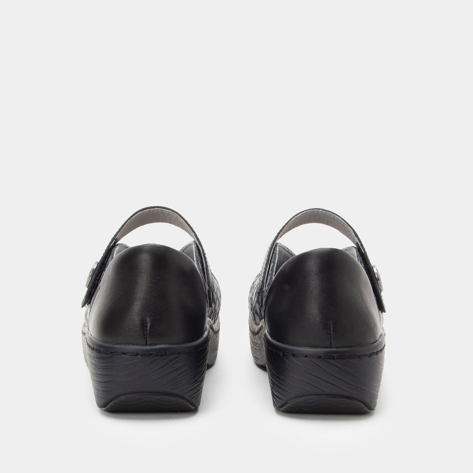 Black clogs on a white background