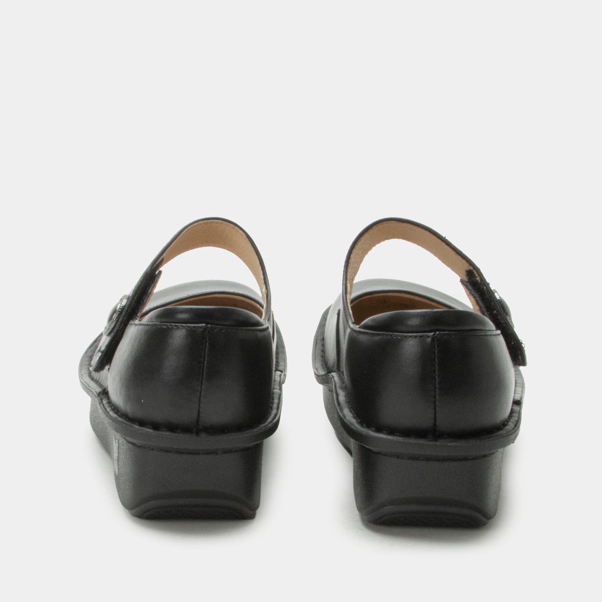 Black leather sandals on a white background