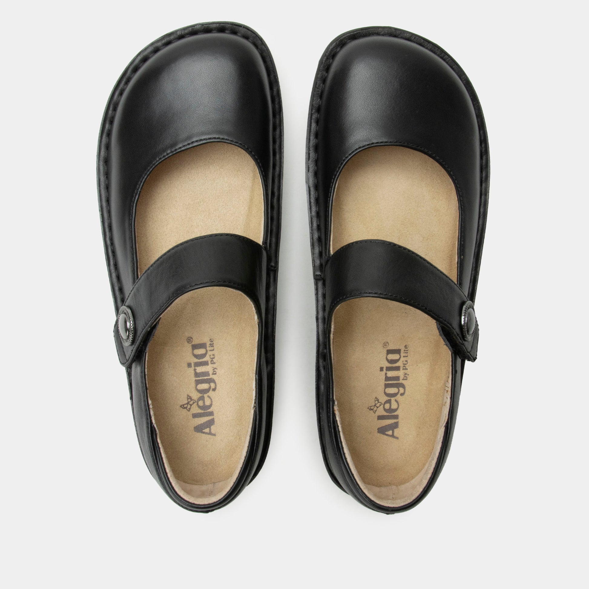 Pair of black leather shoes with 'Alegria' branding on a white background