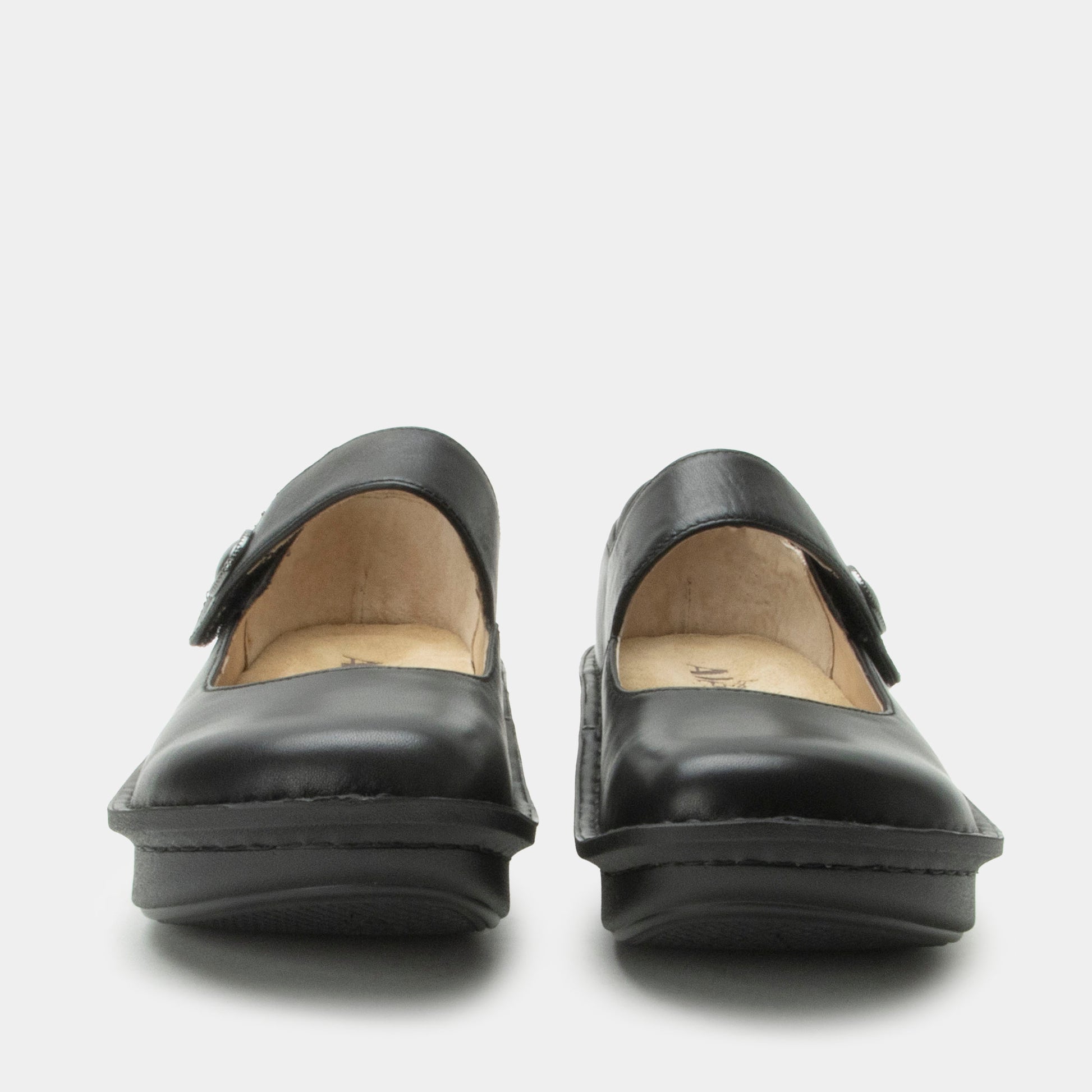 Pair of black shoes on a white background