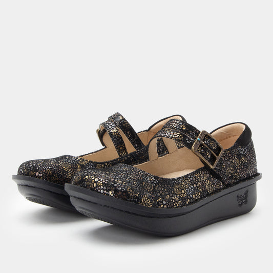 Pair of black and gold glittery shoes with a strap on a white background