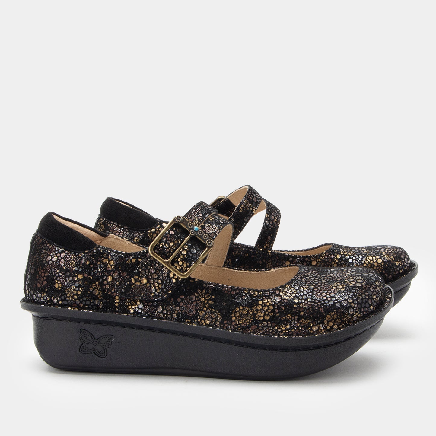 Black and gold glittery shoe with a strap on a white background