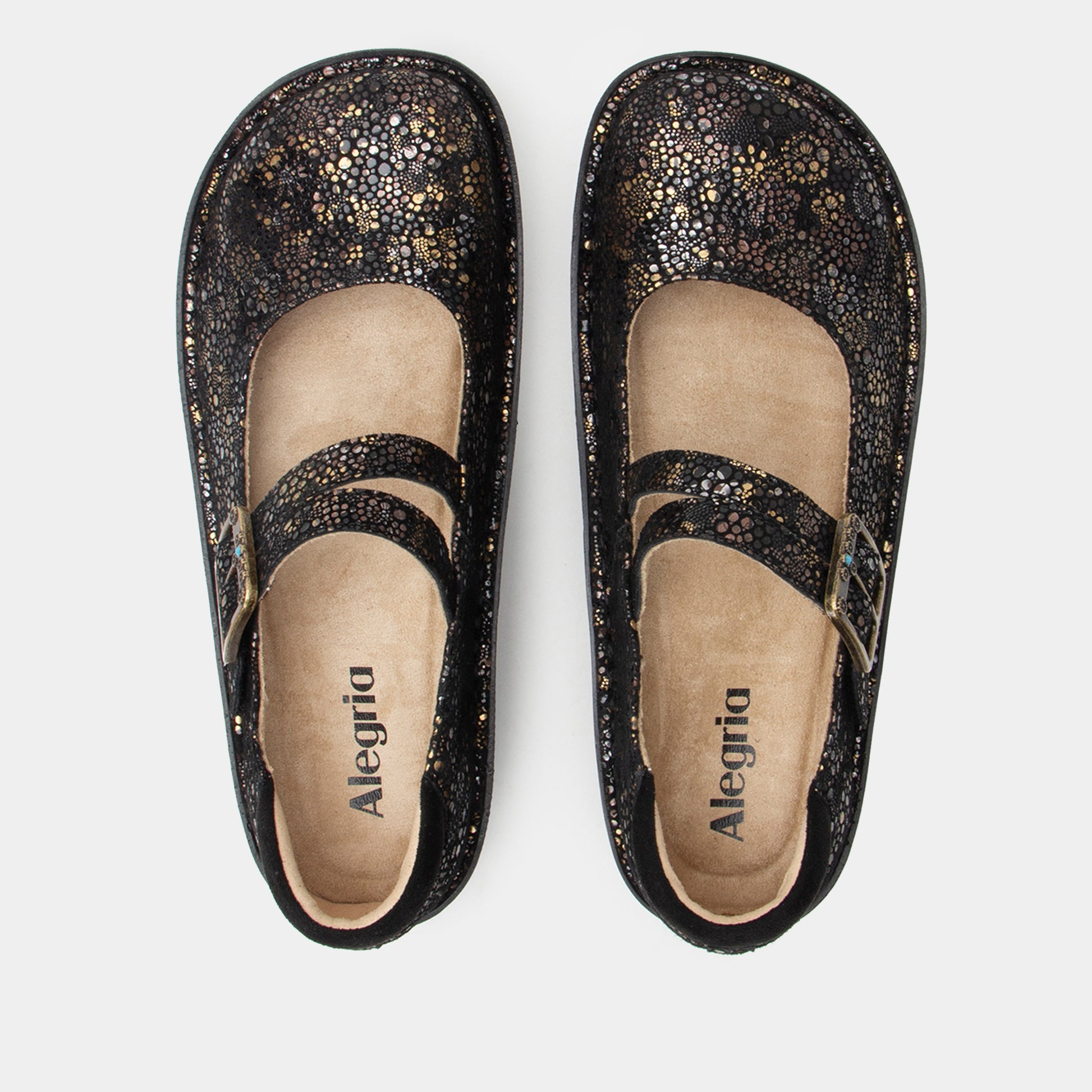 Pair of black glittery shoes with 'Alegria' branding on a light gray background