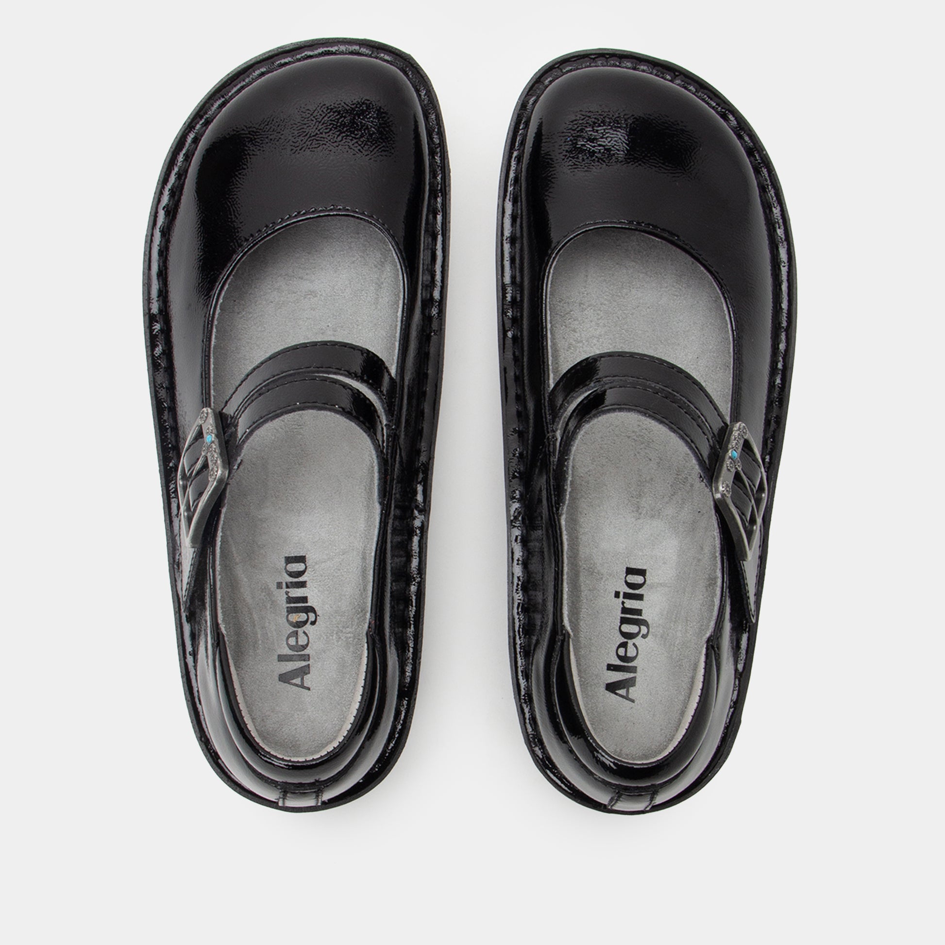 Pair of black sandals with 'Alegria' branding on a white background