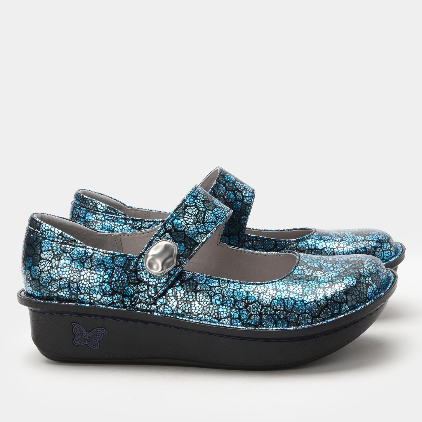 Pair of blue floral-patterned shoes with a strap on a white background