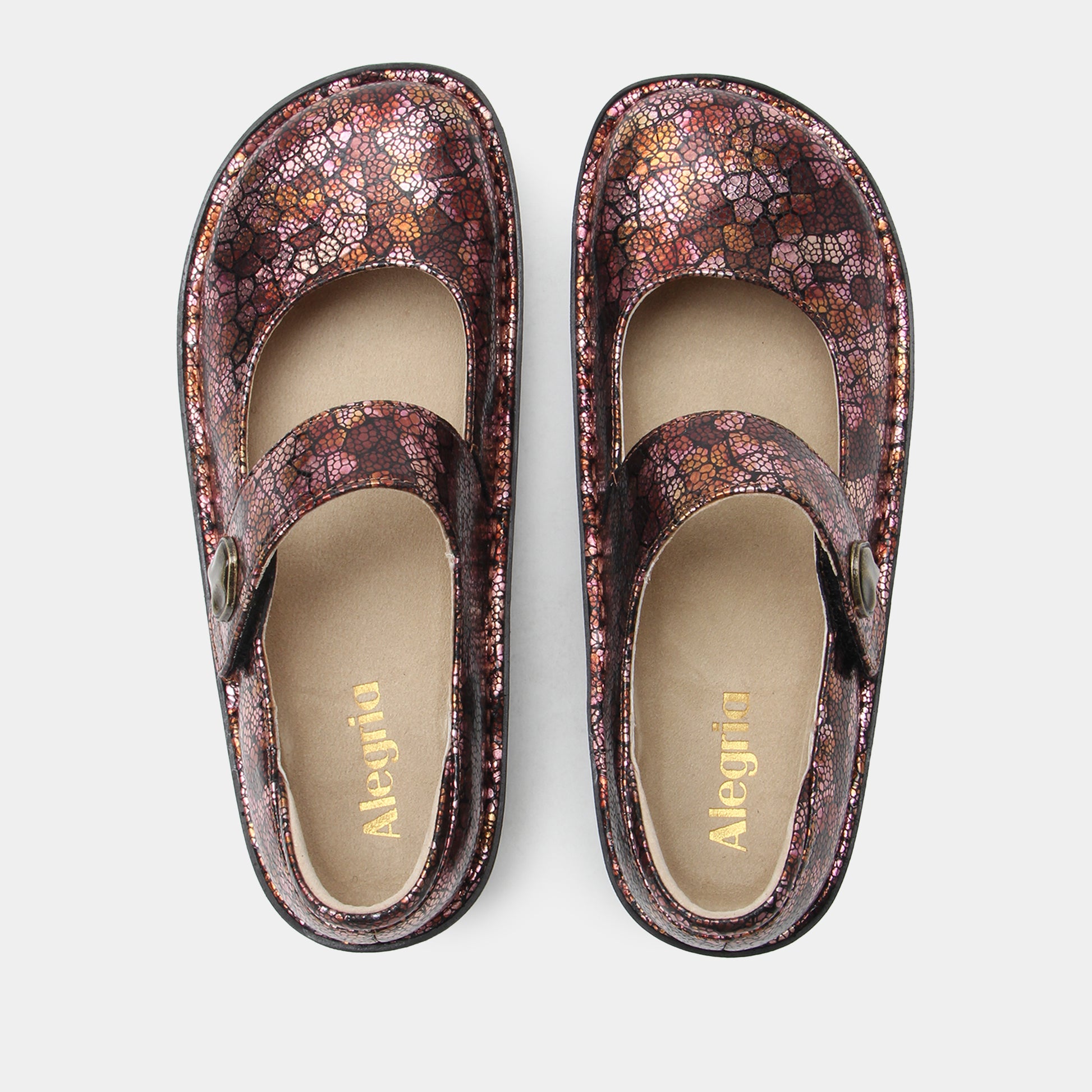 Pair of floral-patterned shoes with 'Alegria' branding on a light gray background