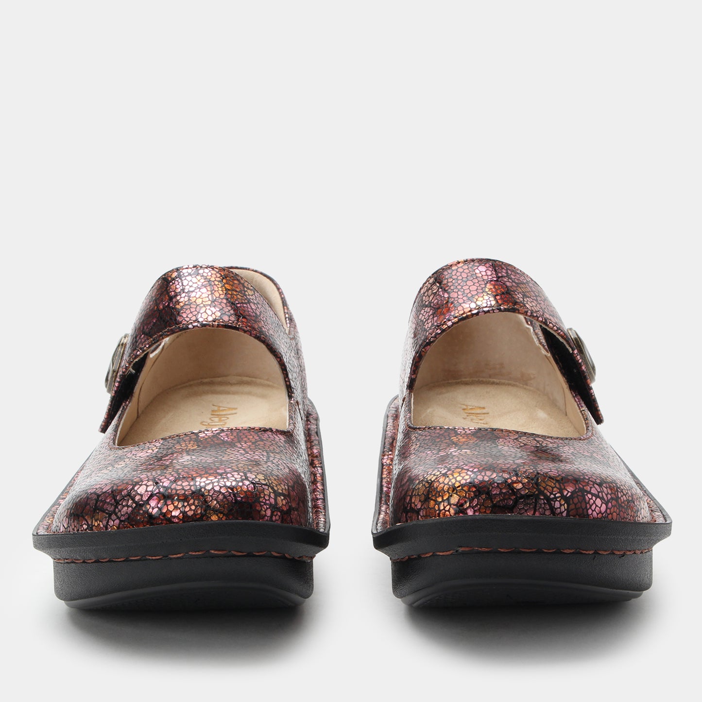 Pair of glittery shoes on a white background