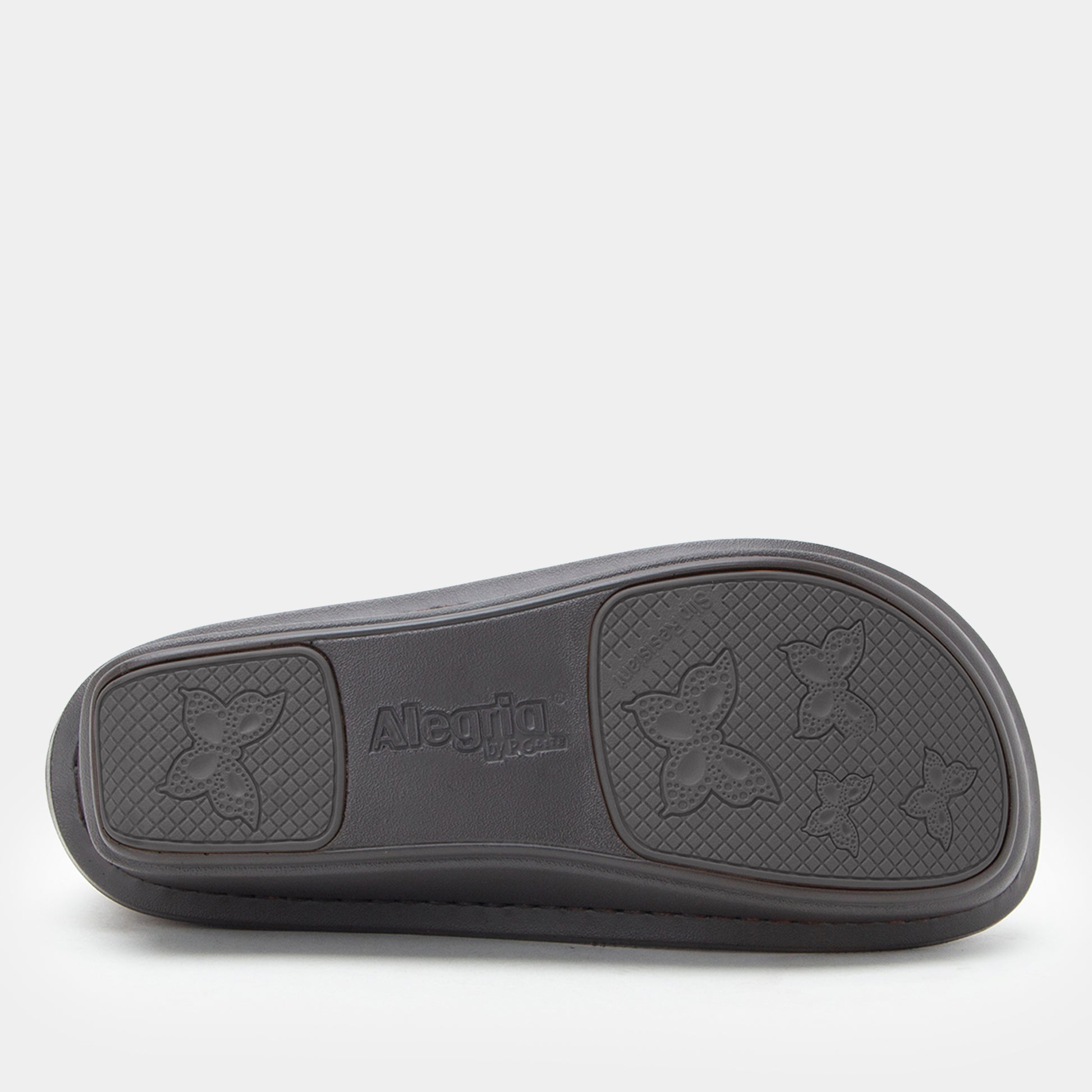 Black Adidas slide sandal on a white background