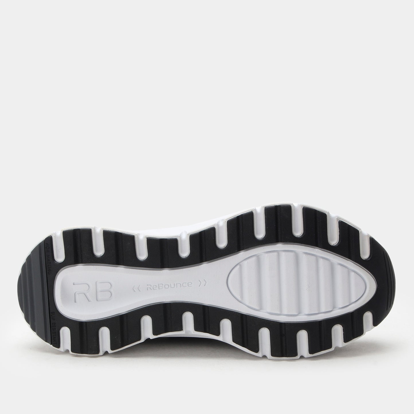 Black and white sole of a shoe with 'RB' branding on a light gray background