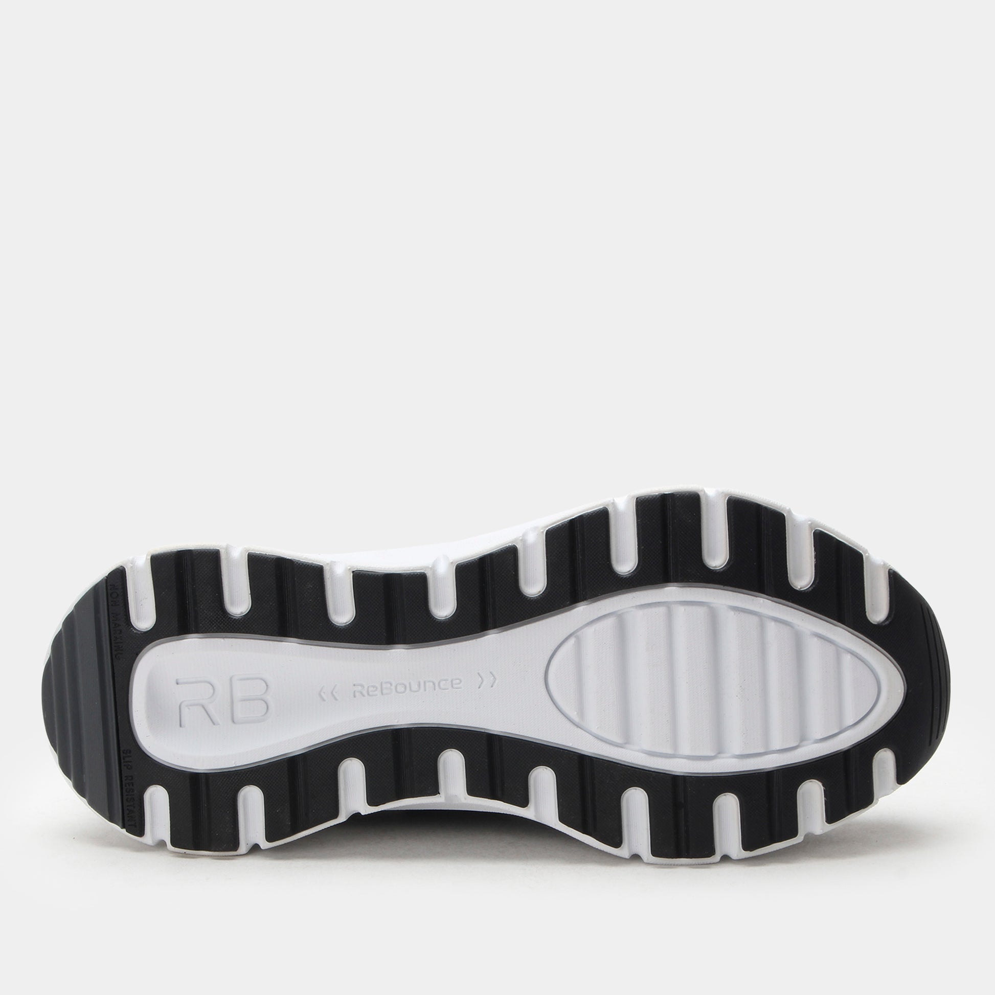 Black and white sole of a shoe with 'RB' branding on a light gray background