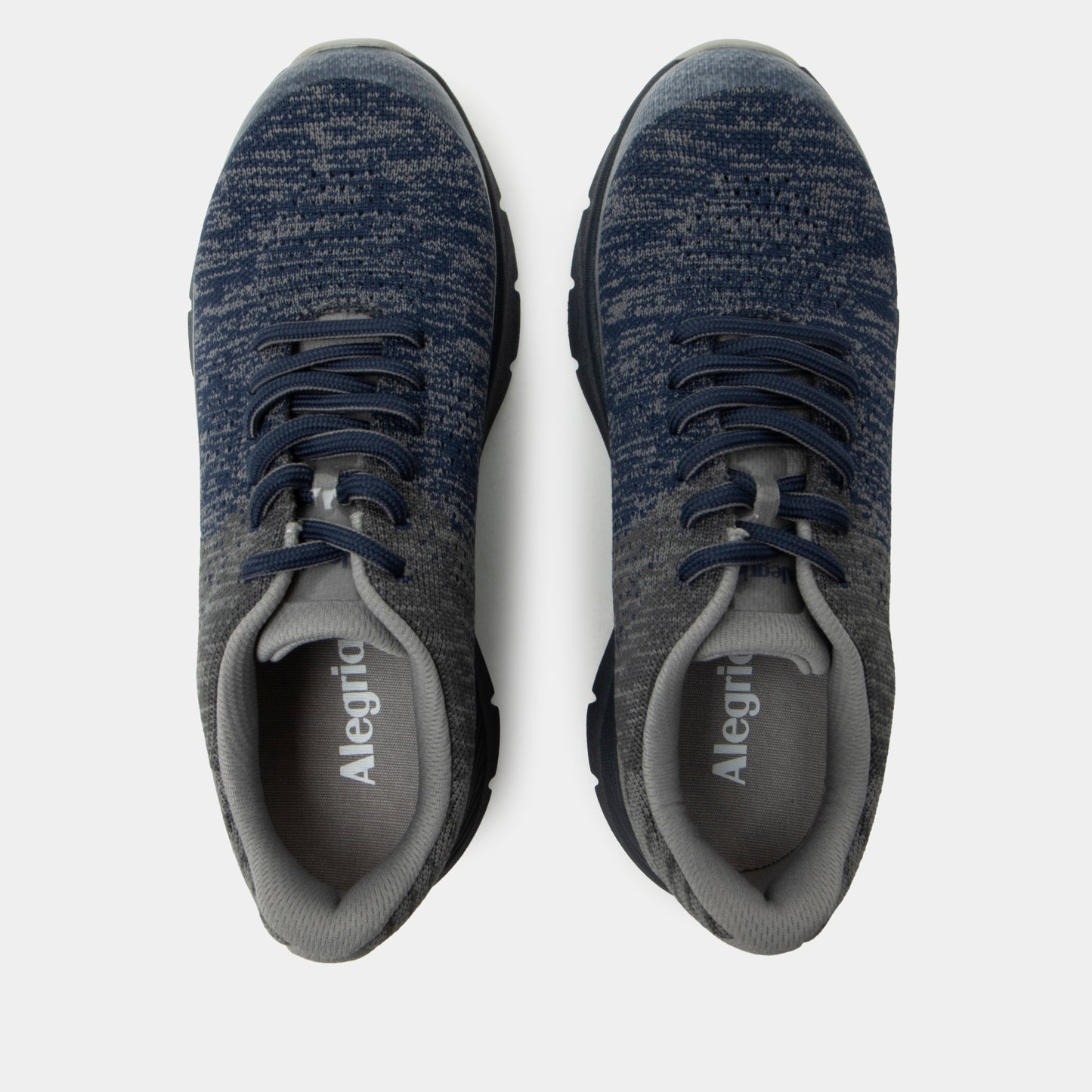Pair of blue sneakers with 'Alegria' branding on a white background
