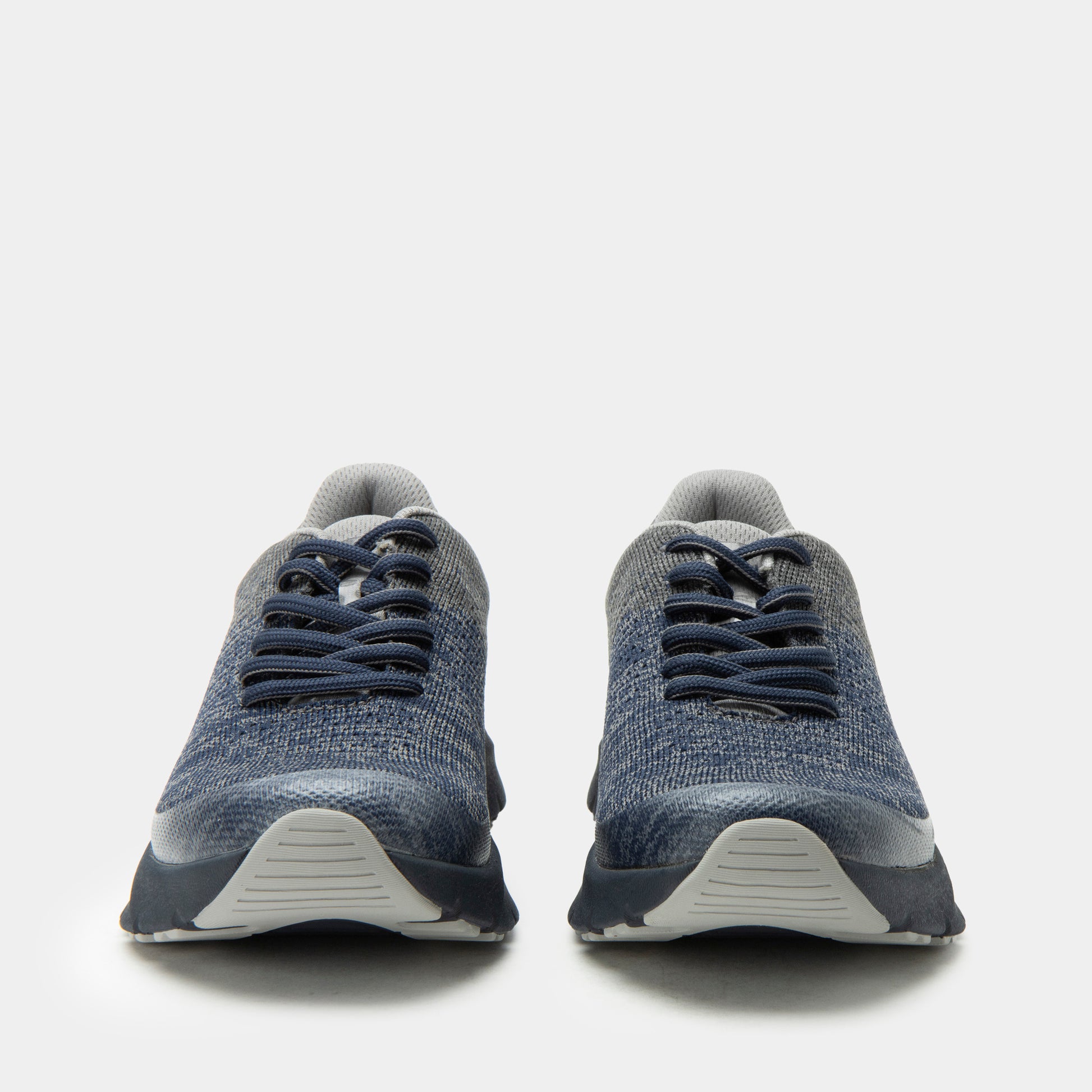 Pair of blue athletic shoes on a white background