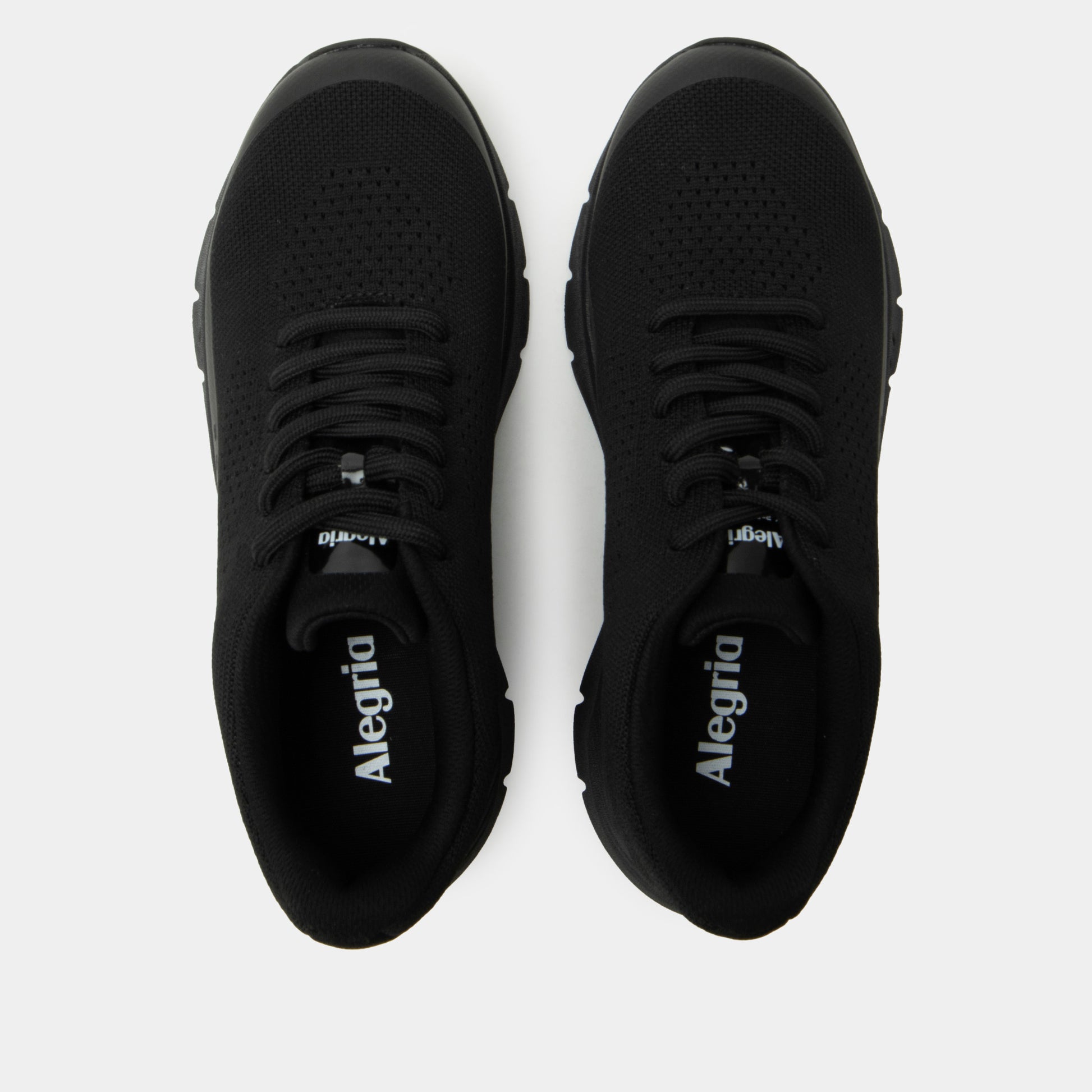 Pair of black Alegria shoes on a white background