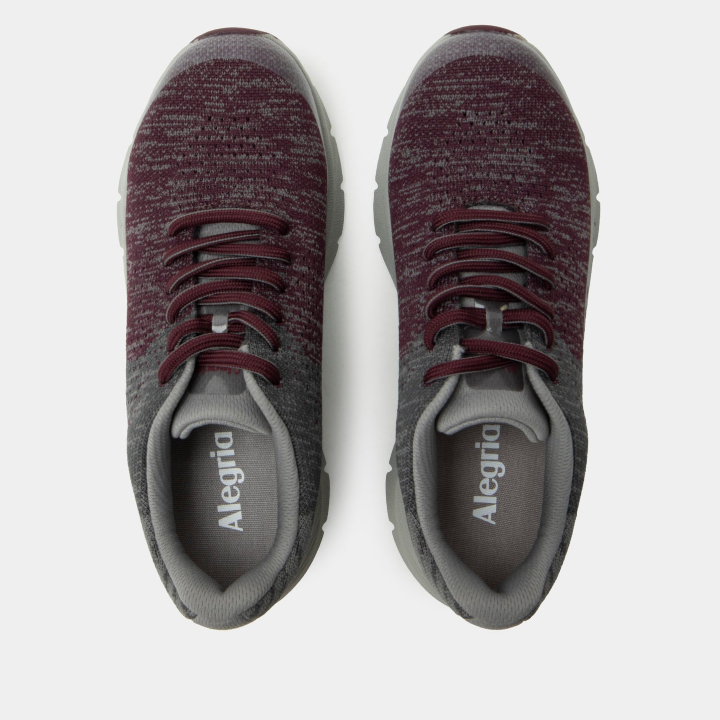 Pair of maroon and gray Alegria shoes on a white background