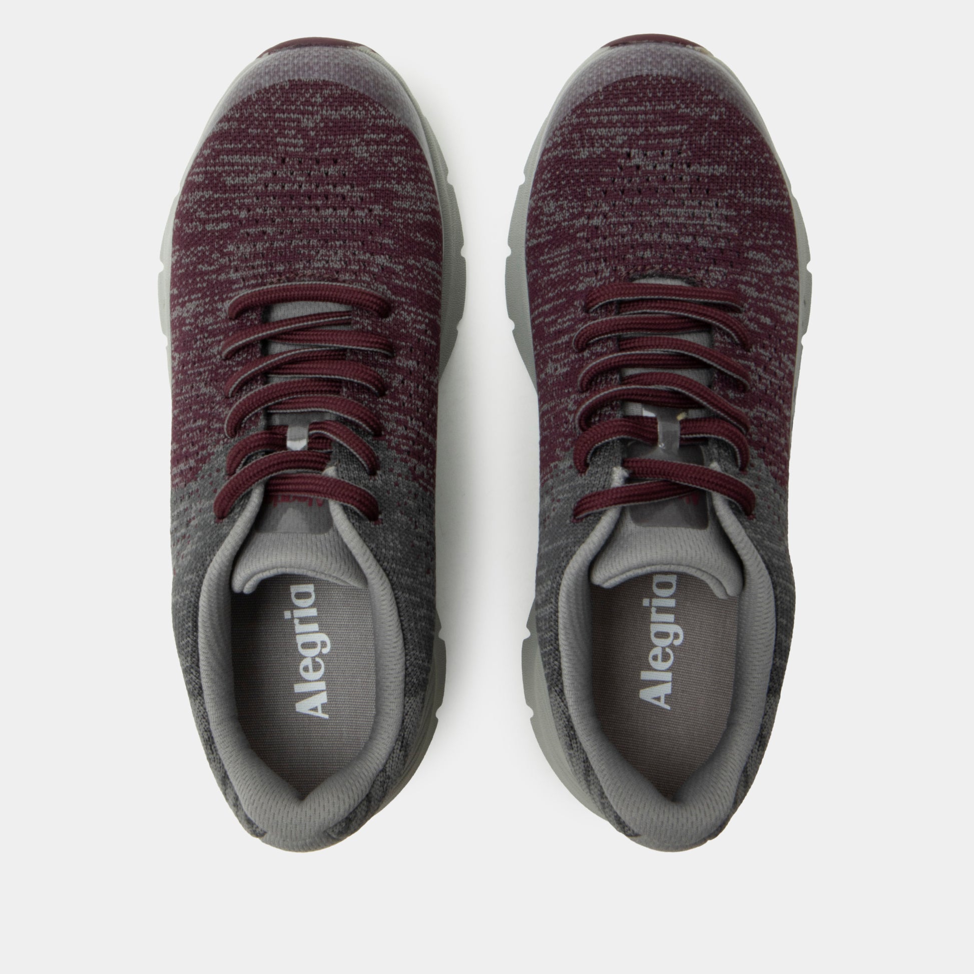 Pair of maroon and gray Alegria shoes on a white background