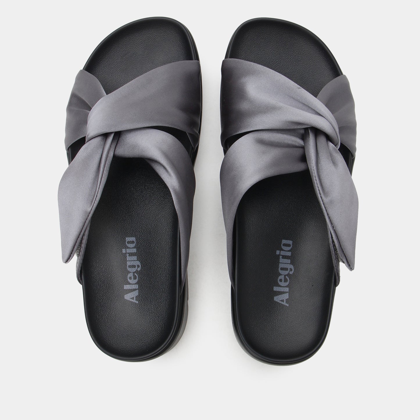 Gray sandals with a bow design on a white background, featuring the brand 'Alegria'.