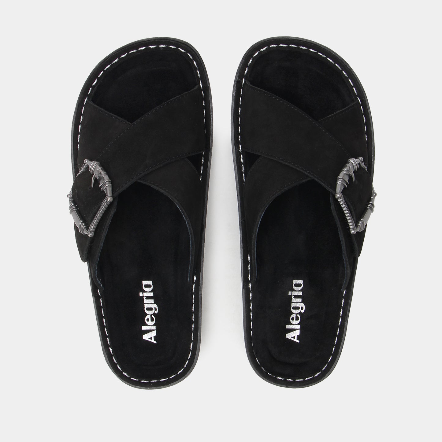 Pair of black sandals with 'Alegria' branding on a light gray background
